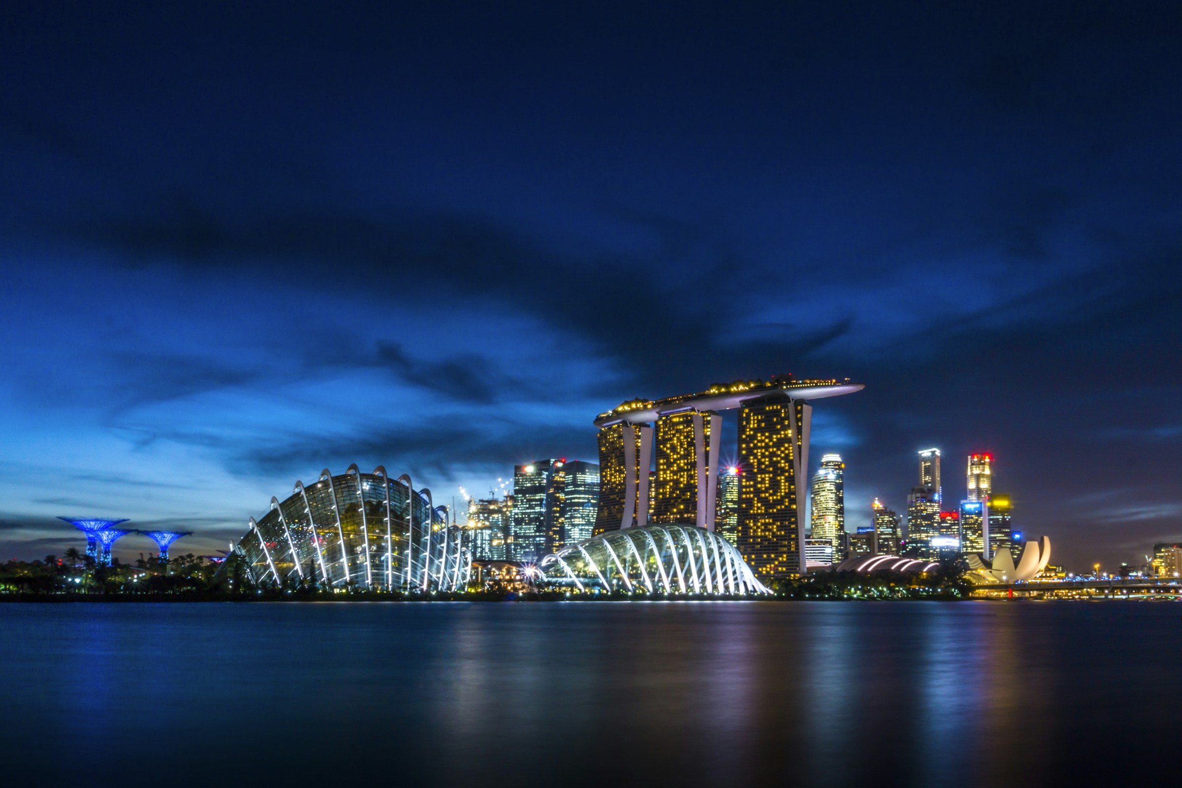 Singapore at blue hour, with Marina Bay Sands and Gardens by the Bay